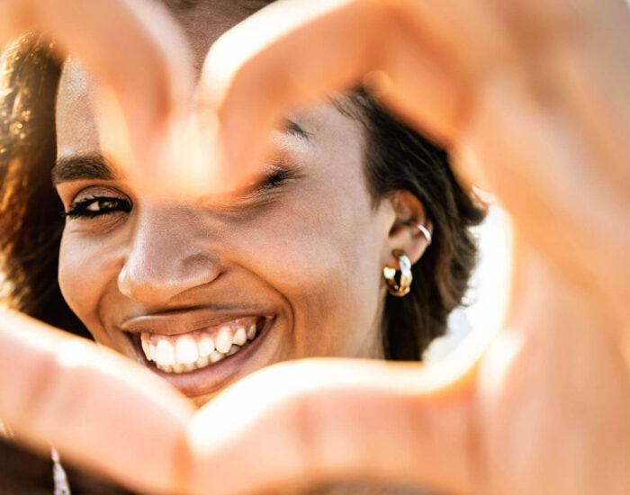 Woman making a heart with her hands